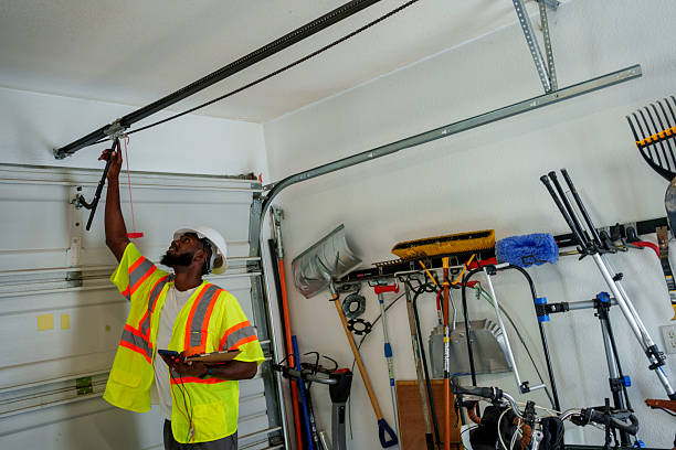 Professional Garage Door Roller Replacement technician working in Plandome, NY